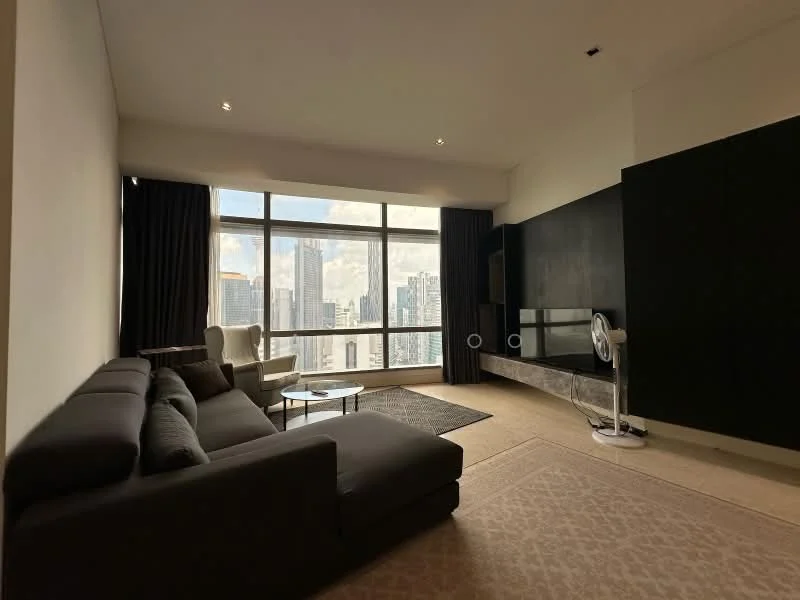 Living features: grey fabric sectional sofa, glass coffee table, floor-to-ceiling windows, black feature wall, light-colored carpet, curtains in dark fabric, wall-mounted TV, decorative fan, marble base for TV unit, city skyline view; style: modern; view: city.