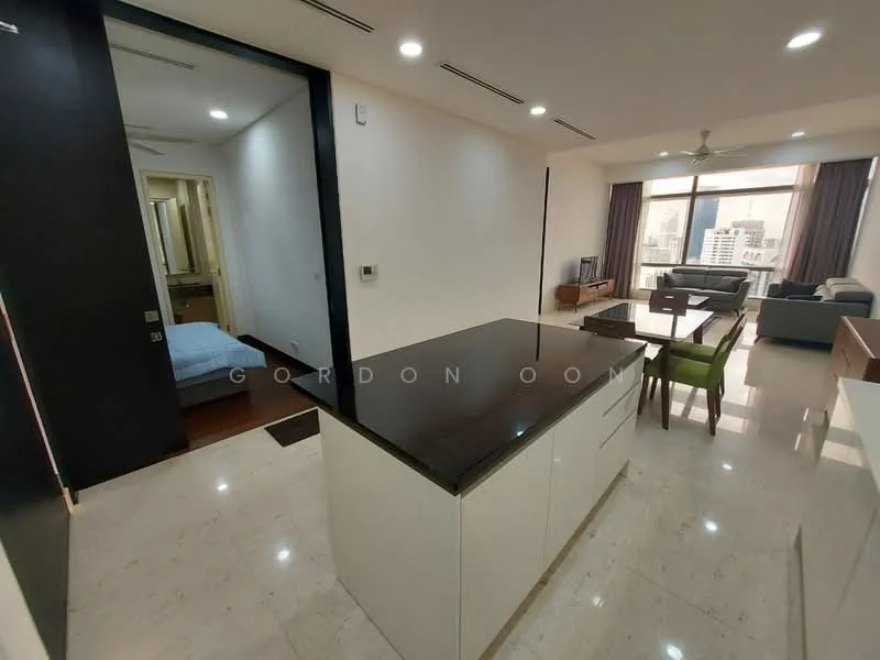 Kitchen features: island kitchen with black granite countertop, white cabinetry, built-in oven, stainless-steel sink, chrome pull-down faucet, recessed downlights, open shelving, floor-to-ceiling windows, view of city skyline; style: modern; view: city. Living features: 3-seater fabric sofa in grey, coffee table, TV console, wall-mounted TV, area rug, floor-to-ceiling windows, curtains, view of city skyline; style: modern; view: city. Bedroom features: queen-size bed, built-in wardrobe, bedside lamps, window with curtains; style: modern.