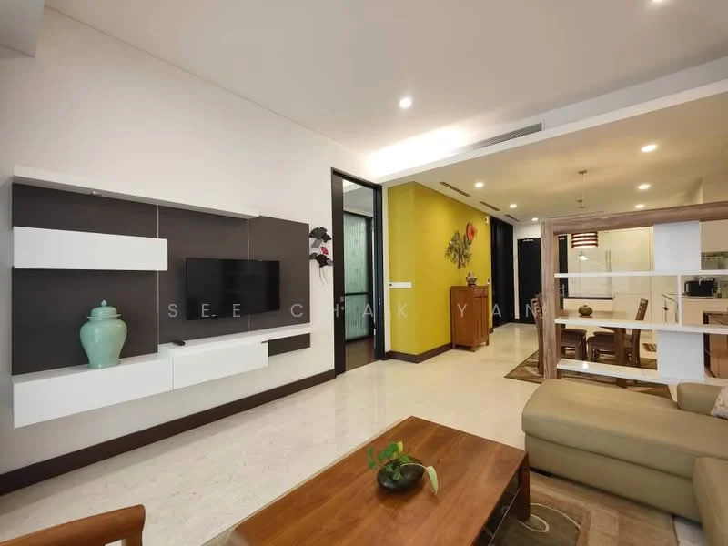 Living features: cream marble flooring, white painted walls, dark accent wall, built-in TV console with storage, wall-mounted TV, green decorative vase, coffee table, beige fabric sofa, area rug with geometric pattern, recessed ceiling lights, open layout to dining area, decorative wall art; style: modern. Room features: yellow painted wall, dining area visible in background, doorway leading to kitchen.