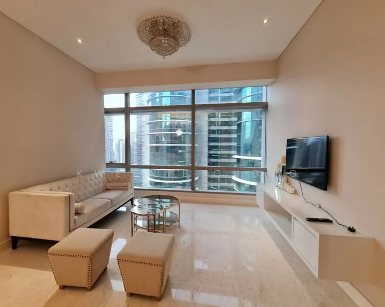 Living features: cream upholstered sofa, glass coffee table, two ottomans, wall-mounted TV, light-colored walls, marble flooring, chandelier, floor-to-ceiling windows, city skyline view; style: modern; view: city.