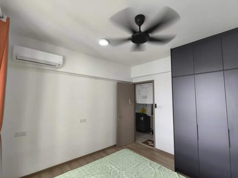 Bedroom features: light wood laminate flooring, white painted walls, 5-blade ceiling fan with light, wall-mounted split AC, built-in wardrobe with sliding doors, window with orange curtains, door leading to hallway, decorative wall art; style: modern.