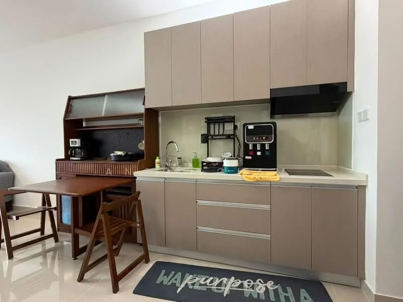 Kitchen features: brown cabinetry, white countertop, single-bowl stainless-steel sink, chrome pull-down faucet, built-in stove, built-in oven, microwave, refrigerator, kitchen island, wooden dining table, wooden chairs, tile flooring, wall-mounted shelves, decorative mat; style: modern.