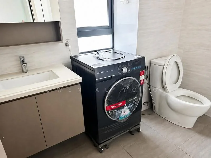 Bathroom features: single-sink vanity with wood cabinet, chrome basin mixer, framed mirror, one-piece toilet, front-load washing machine, grey tiled walls, light grey tiled flooring, window with view, wall-mounted storage, modern lighting; style: modern.
