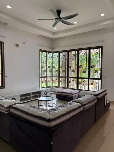 Living features: L-shape sectional sofa in grey, coffee table, floor-to-ceiling windows, window grills with floral pattern, recessed downlights, ceiling fan, cream painted walls, tile flooring; style: modern; view: garden.