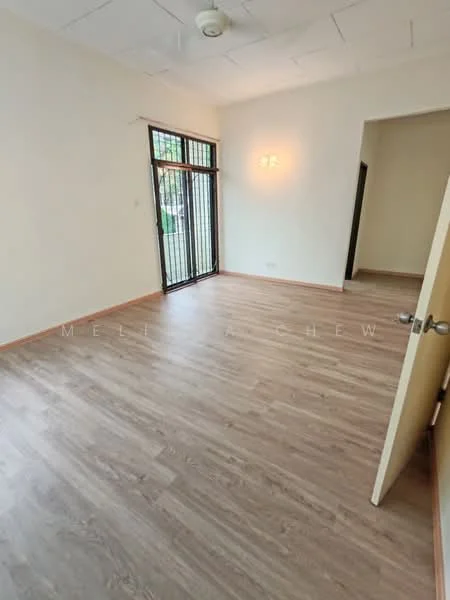 Room features: laminate flooring, white painted walls, ceiling fan, large window with metal grille, door leading to another room, natural light from window, neutral color scheme, baseboards; style: modern; view: garden.
