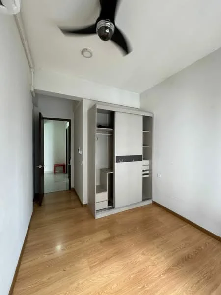 Room features: wooden flooring, white painted walls, ceiling fan, built-in wardrobe with sliding doors, door leading to hallway, natural light from door opening; style: modern.