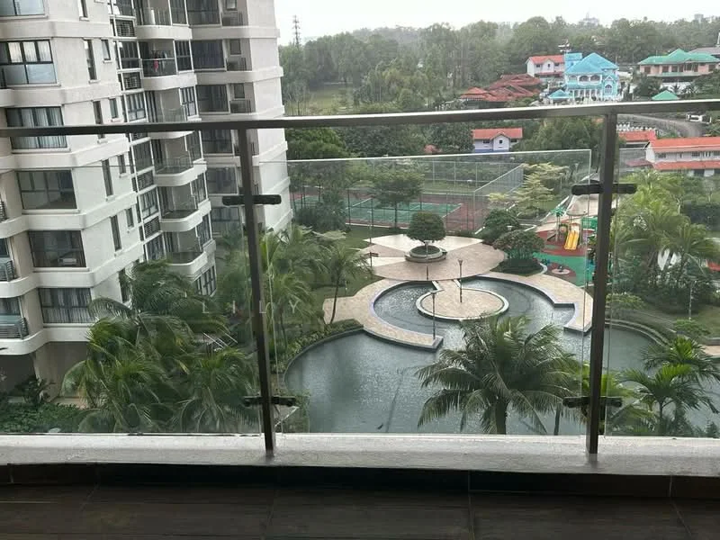 Balcony features: glass railing, tile flooring, view of garden, view of swimming pool, surrounded by greenery; view: garden.