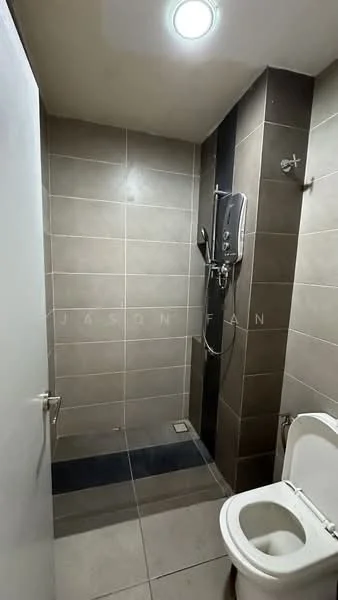 Bathroom features: grey ceramic tile flooring, light grey wall tiles, dark grey accent wall, walk-in shower with glass enclosure, rain shower head, handheld shower, chrome shower mixer, one-piece toilet, single towel bar, recessed ceiling light; style: modern.