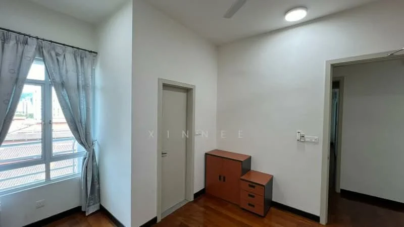 Room features: white painted walls, wooden flooring, window with sheer curtains, ceiling light, door to another room, small cabinet with drawers, corner desk, natural light from window.