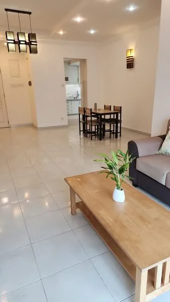 Living features: white painted walls, glossy ceramic tile flooring, 5-blade ceiling fan with light, sofa in grey fabric, wooden coffee table, dining table with 4 chairs, decorative plant in white pot, wall-mounted light fixtures; style: modern. Kitchen features: white cabinetry, stainless-steel sink, built-in oven, freestanding range oven, microwave, ceramic tile backsplash; style: modern.