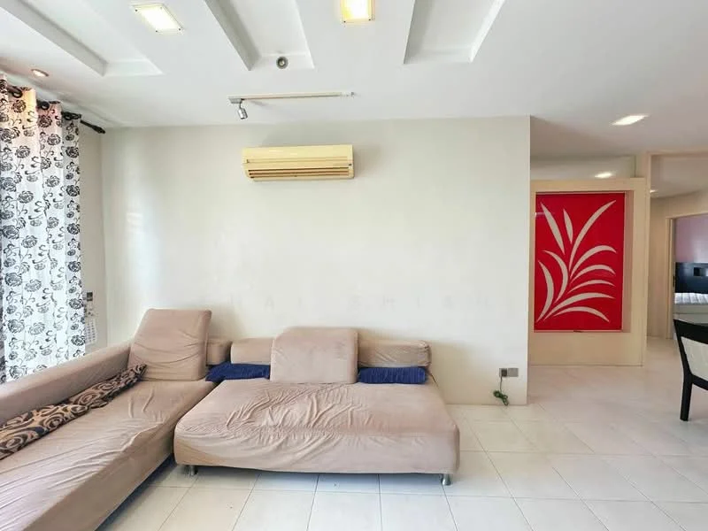 Living features: beige fabric sectional sofa, white walls, recessed ceiling lights, wall-mounted air conditioning unit, large window with sheer curtains, tile flooring, decorative wall with red design, black and white patterned curtains; style: modern.