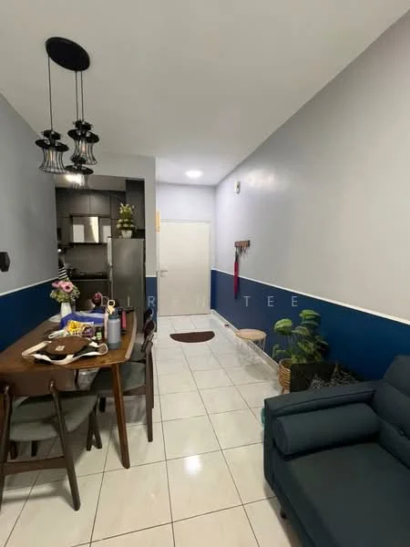 Dining features: dining table with four chairs, pendant lighting with multiple bulbs, white walls with blue accent wall, ceramic tile flooring, refrigerator, wall-mounted hooks, decorative plants, open kitchen area, sofa in living area; style: modern. Hallway features: white walls, ceramic tile flooring, decorative plants, doorway leading to kitchen, wall-mounted hooks; style: modern.