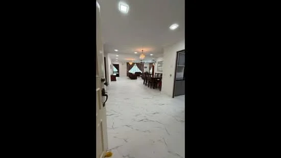 Room features: marble tile flooring, recessed LED downlights, dining table with chairs, large windows, curtains, chandelier, open layout, neutral wall color; style: modern; view: garden.