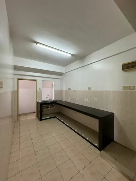 Kitchen features: white painted walls, tile flooring, black countertop, single-bowl stainless-steel sink, chrome pull-down faucet, fluorescent ceiling lights, open layout, no visible cabinetry.