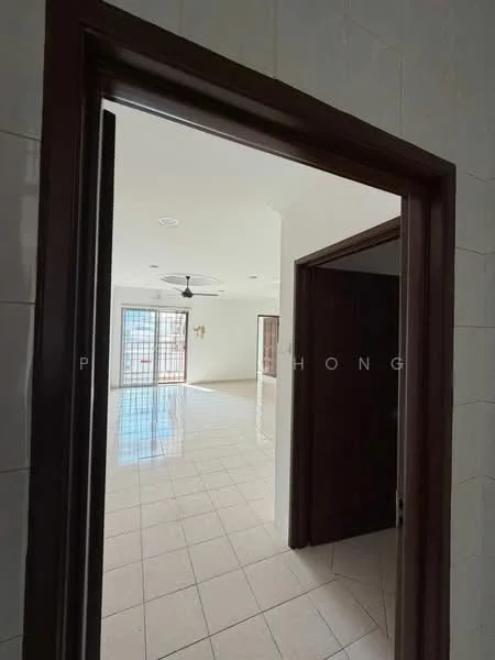 Room features: white painted walls, cream tiled flooring, ceiling fan, multiple windows, natural light, doorway leading to another room, window treatments not visible, open layout.