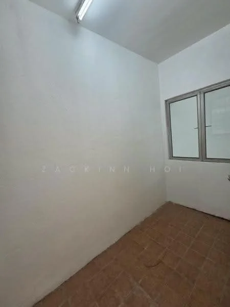 Room features: white painted walls, tile flooring, single window, fluorescent ceiling light.