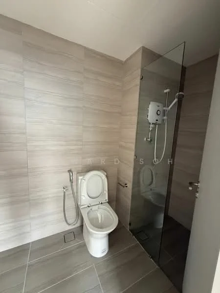 Bathroom features: one-piece toilet, glass shower enclosure, handheld shower, wall-mounted shower head, grey ceramic tile flooring, beige wall tiles, chrome bidet spray, chrome faucet, sliding glass door; style: modern.