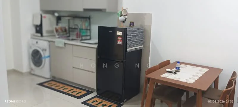 Kitchen features: black fridge, built-in cabinets in light grey, white countertop, single-bowl stainless-steel sink, chrome pull-down faucet, washing machine, dining table with four chairs, decorative table runner, floor tiles in light color, wall-mounted shelf, kitchen utensils on shelf, area rug with cactus pattern; style: modern.