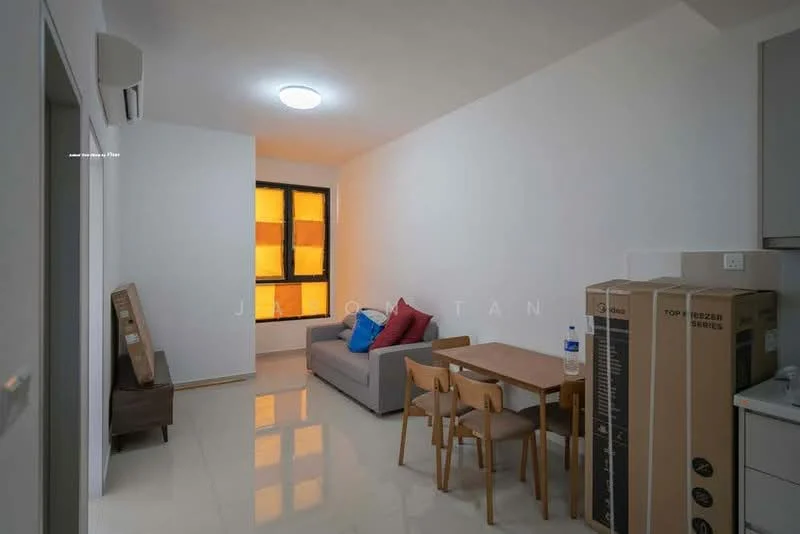 Living features: grey fabric sofa, wooden dining table, 4 wooden dining chairs, wall-mounted split AC, recessed ceiling light, cream painted walls, glossy tile flooring, large window with orange curtains, TV console, cardboard boxes, decorative wall art; style: modern.
