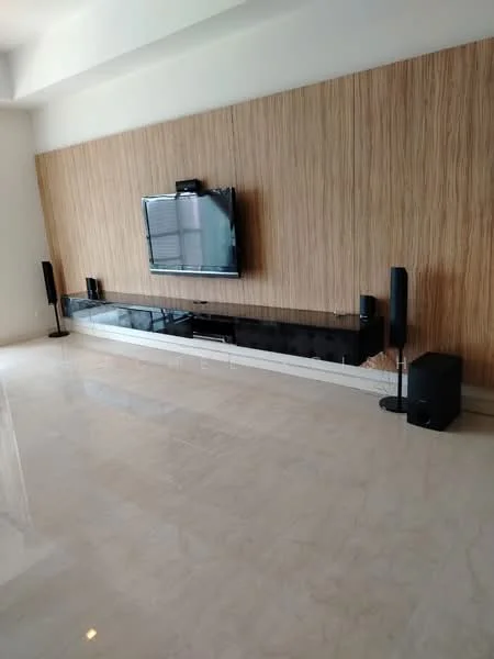 Living features: marble flooring, wood panel accent wall, wall-mounted TV, black glass TV console, two black floor speakers, black subwoofer, large windows with natural light, recessed lighting; style: modern.