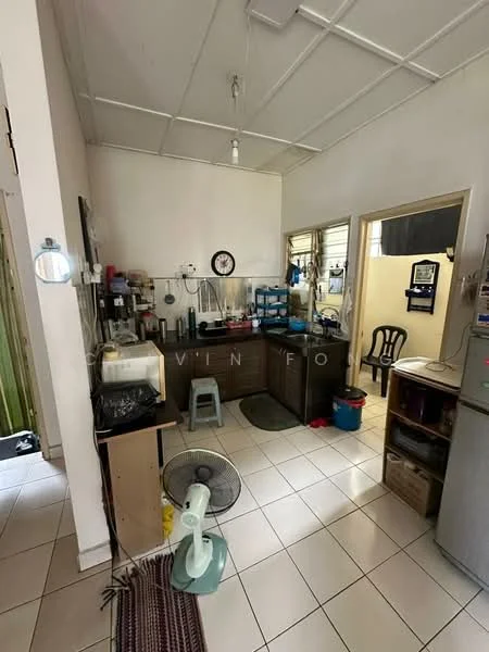 Kitchen features: white painted walls, tile flooring, ceiling fan, single-bowl stainless-steel sink, chrome pull-down faucet, wood cabinetry, built-in fridge, freestanding stove, microwave, countertop with space for appliances, window with sheer curtains, open shelving, plastic storage bins, kitchen mat.