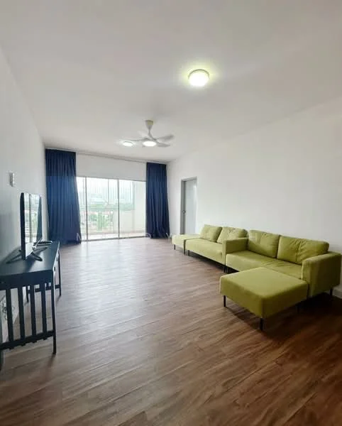 Living features: green L-shape sectional sofa, 3-seater fabric sofa, wooden TV console, wall-mounted TV, laminate flooring, white painted walls, ceiling fan, floor-to-ceiling sliding glass door, curtains in dark blue, natural light from balcony, area rug; style: modern; view: city.