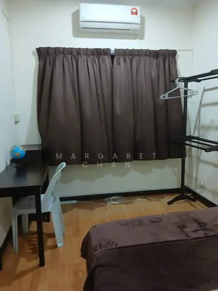 Room features: brown curtains, wooden flooring, wall-mounted air conditioning unit, black clothing rack, small black desk, white plastic chair, globe on desk.