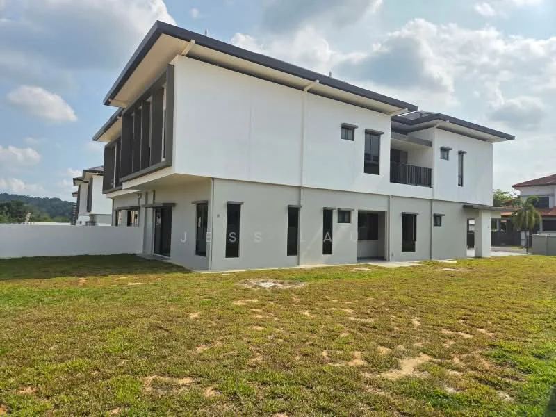 Exterior type: detached bungalow; features: white painted facade, flat roof, 2-storey building, large windows, balconies on upper level, manicured lawn, surrounded by greenery, driveway, fenced perimeter; style: modern.
