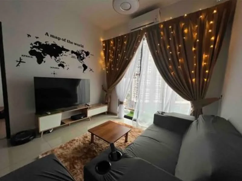 Living features: grey fabric sofa, wooden coffee table, wall-mounted TV, TV console, decorative wall decal of a world map, floor-to-ceiling windows, sheer curtains with fairy lights, area rug with plush texture, air conditioning unit, recessed ceiling lights; style: modern; view: city.