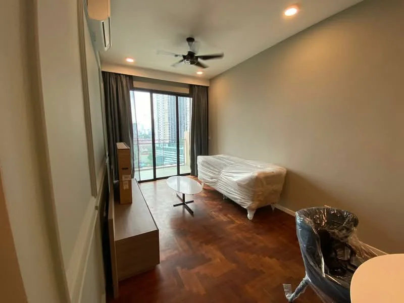Living features: wooden flooring, cream painted walls, 5-blade ceiling fan, floor-to-ceiling windows, sliding glass door, curtains, sofa wrapped in plastic, coffee table, TV console, decorative wall, balcony view; style: modern; view: city.