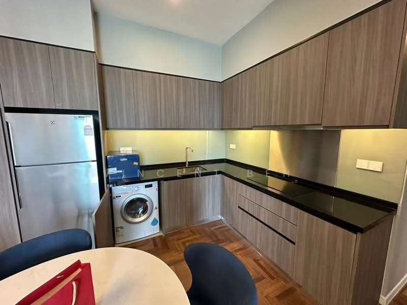 Kitchen features: dark granite countertop, wood cabinetry with a laminate finish, stainless-steel fridge, built-in washing machine, single-bowl stainless-steel sink, chrome pull-down faucet, under-cabinet lighting, parquet wood flooring, round dining table, upholstered dining chairs; style: modern.