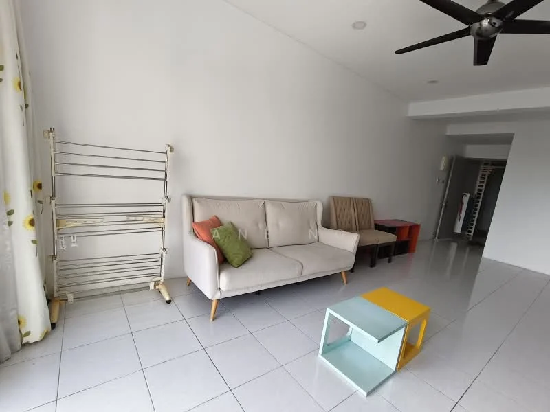 Living features: light grey fabric sofa, green and orange accent pillows, wooden legs on sofa, small yellow side table, small blue side table, folding clothes drying rack, white walls, white tiled flooring, ceiling fan, floor-to-ceiling curtains with floral pattern, wooden dining chair, red and black side table; style: modern.