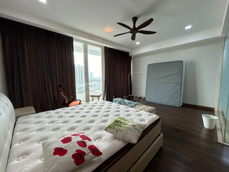 Bedroom features: king-size bed, upholstered headboard, decorative pillows with floral pattern, dark brown curtains, wooden flooring, ceiling fan with light, floor-to-ceiling windows, city view, empty mattress frame, clothes drying rack, waste bin; style: modern; view: city.