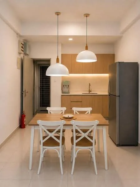 Kitchen features: white painted walls, light wood cabinetry, marble countertop, stainless-steel fridge, built-in sink, chrome pull-down faucet, pendant lighting, dining table with four chairs, ceramic tile flooring, recessed lighting, kitchen backsplash with light color, fire extinguisher; style: modern.