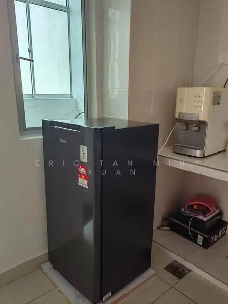 Room features: black fridge, white countertop, kitchen appliances, tile flooring, window with natural light, light-colored wall tiles, drainage grate on floor.