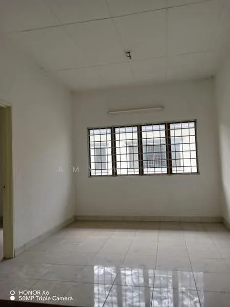 Room features: white painted walls, plain ceiling, tile flooring, three rectangular windows with metal grills, neutral color scheme, no visible furniture, bright natural light, corner room; style: minimalist.