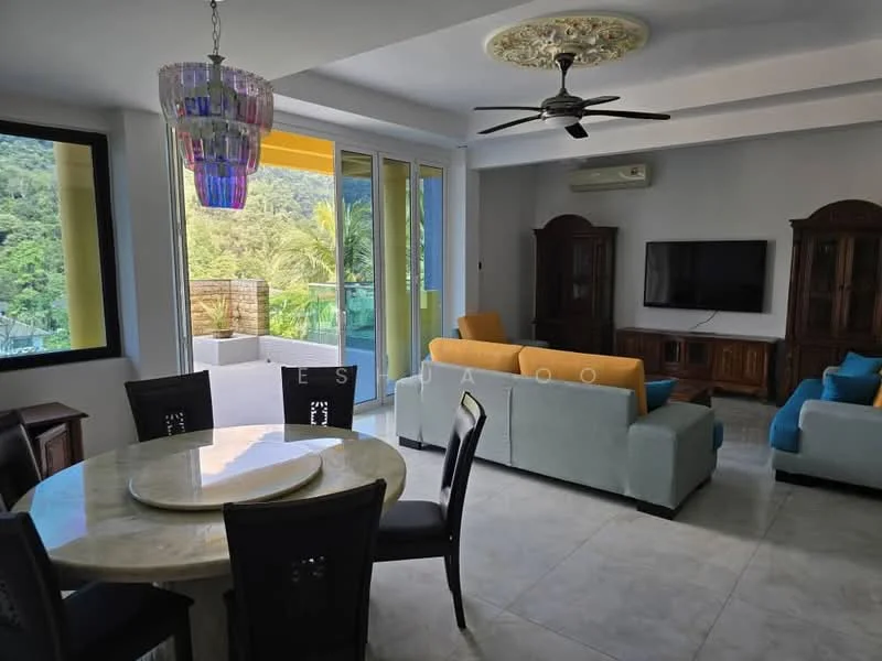 Living features: sofa in light blue, 3-seater fabric sofa, 2-seater fabric sofa, coffee table with round marble top, wall-mounted TV, wooden cabinets, ceiling fan with light, large windows with mountain view, decorative ceiling with intricate design, tile flooring, area rug, chandelier with crystals; style: modern; view: mountain. Dining features: round dining table, 4 black dining chairs, marble tabletop; style: modern.