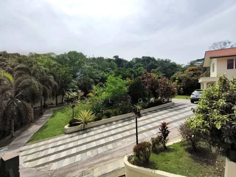 Exterior type: detached bungalow; features: manicured lawn, mature trees, tropical landscaping, stone-paved walkway, driveway with interlocking pavers, surrounded by greenery, car parked in driveway, two-storey building, garden beds with flowering plants; style: tropical-modern.