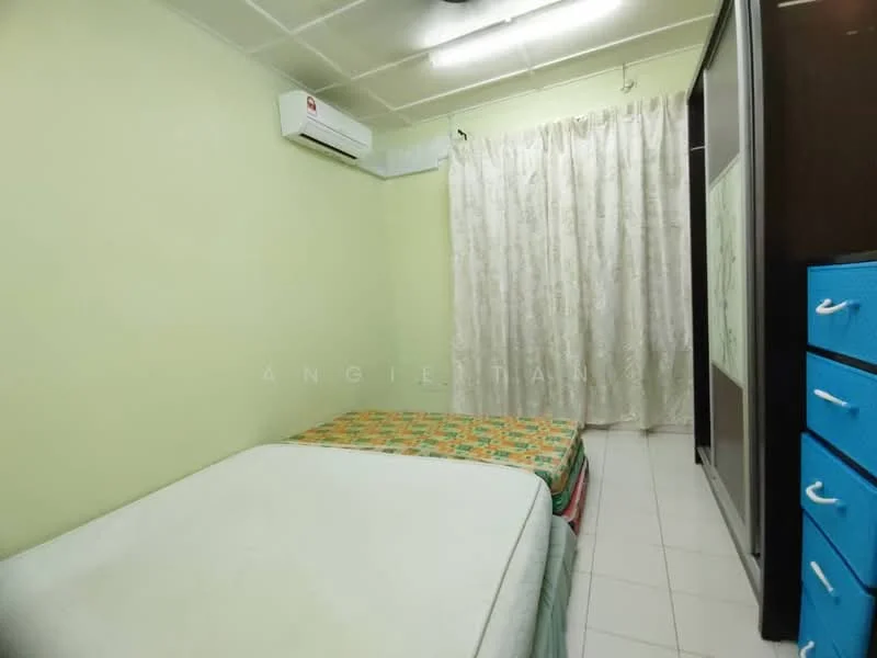Bedroom features: green painted walls, white ceiling, 1 wall-mounted split AC, single bed with mattress, bed frame with colorful bedding, curtains with floral pattern, built-in wardrobe with sliding doors, blue dresser, tile flooring.