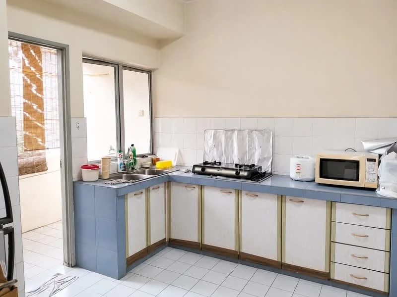 Kitchen features: L-shaped kitchen layout, white tiled walls, light blue countertop, wooden cabinetry with cream finish, stainless-steel gas hob, built-in microwave, double-bowl stainless-steel sink, window with bamboo blinds, white tiled flooring, refrigerator, kitchen utensils on countertop; style: modern.