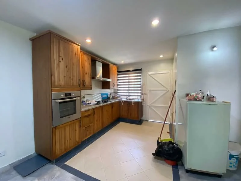 Kitchen features: wooden cabinetry, stainless-steel built-in oven, white countertop, tile backsplash, single-bowl stainless-steel sink, chrome pull-down faucet, sliding glass door, window with blinds, ceramic tile flooring, refrigerator, kitchen island, wall-mounted light fixture, cleaning supplies visible; style: modern.