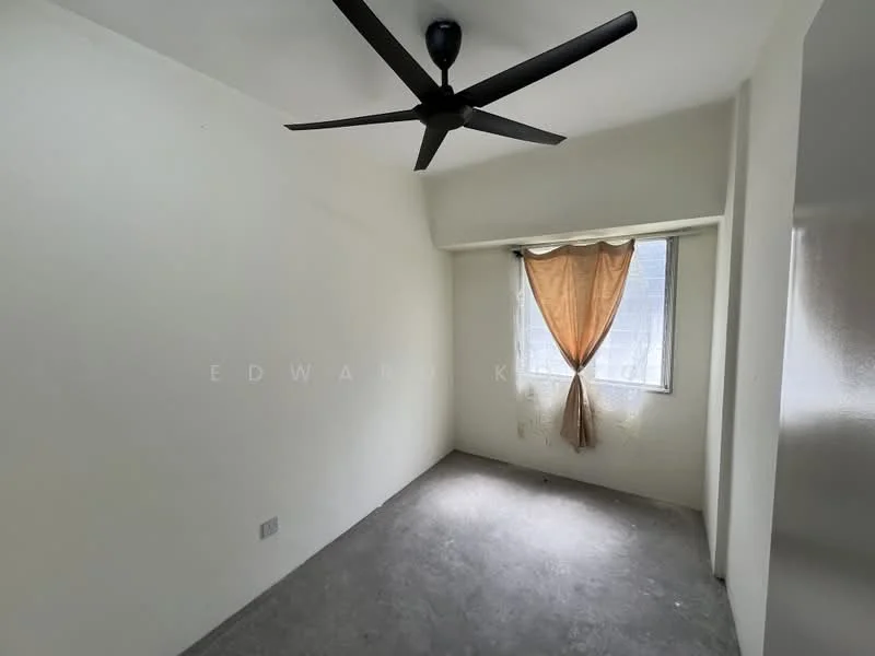 Room features: white painted walls, grey concrete flooring, 5-blade ceiling fan, single window with sheer curtains, natural light from window.
