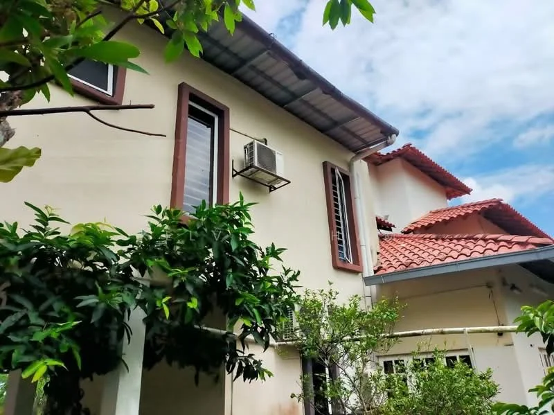 Exterior type: detached bungalow; features: cream painted facade, red tile roof, single-storey, window-mounted air conditioning unit, manicured landscaping with shrubs, outdoor greenery, covered porch area; style: modern.