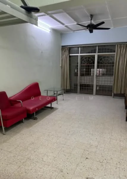 Living features: red fabric sofa, glass coffee table, ceiling fan, white painted walls, tile flooring, curtains, sliding glass door, grill gate.