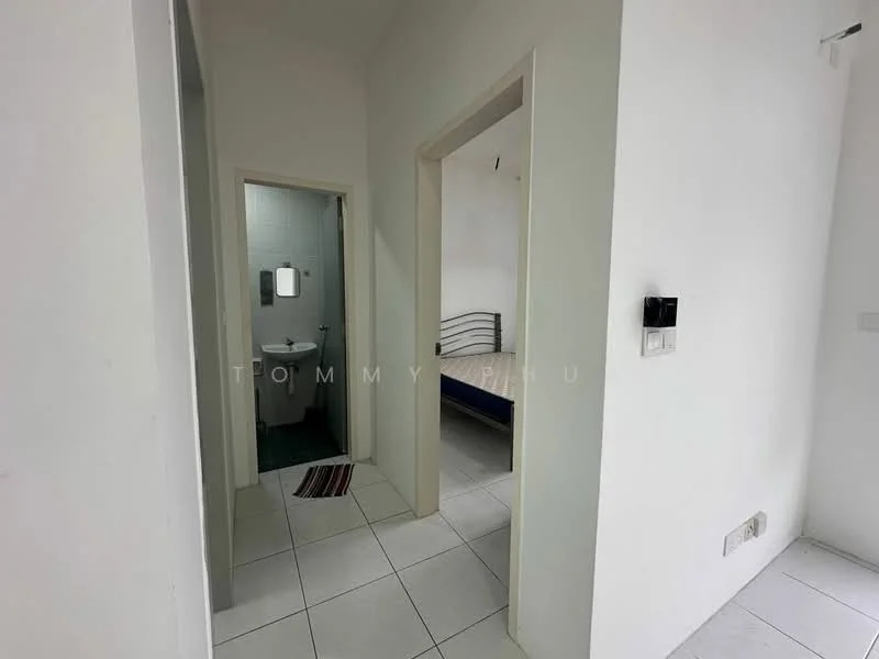 Room features: white painted walls, white tiled flooring, doorway leading to bathroom, doorway leading to bedroom, light switch, wall-mounted intercom, rug at entrance; style: modern.