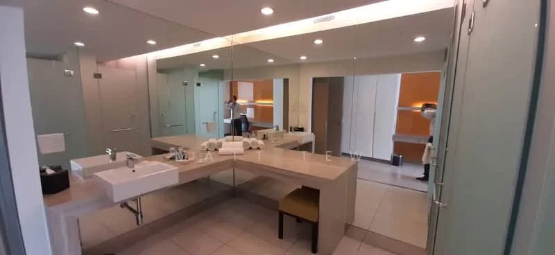 Bathroom features: double-sink vanity with stone countertop, large wall-mounted mirror, white ceramic sink, chrome basin mixer faucets, light-colored tile flooring, built-in cabinetry, recessed lighting, neutral wall color, separate toilet area, towel rack, decorative accessories on countertop; style: modern.