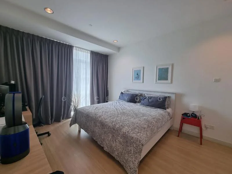 Bedroom features: queen-size bed with patterned bedding, floor-to-ceiling windows, grey curtains, light wood flooring, two framed artworks on the wall, nightstand with lamp, desk with computer monitor, chair, wall-mounted electrical outlet; style: modern.