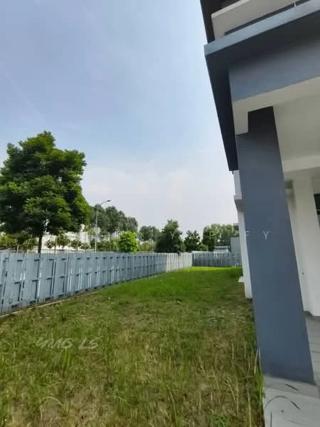 Exterior features: green lawn, fenced yard, grey painted facade, trees in vicinity, paved walkway, clear sky; style: modern.