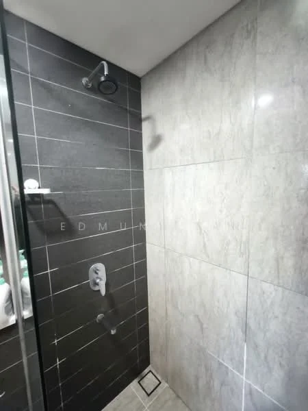 Bathroom features: walk-in shower with glass enclosure, rain shower head, handheld shower, grey marble tile cladding, black accent wall with tile cladding, chrome shower controls, built-in shower niche, floor drain; style: modern.