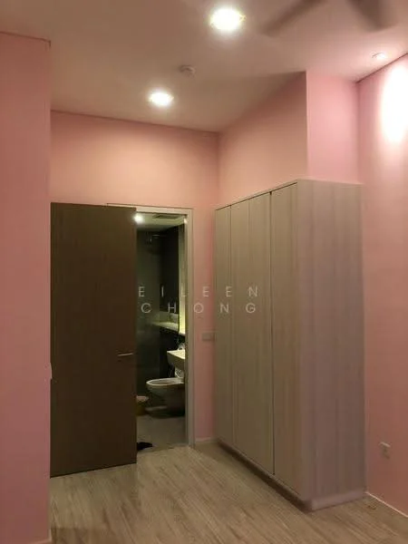 Room features: pink painted walls, light wood flooring, built-in wardrobe with sliding doors, door leading to bathroom, recessed ceiling lights, ceiling fan, neutral-coloured door, bathroom door visible; style: modern.